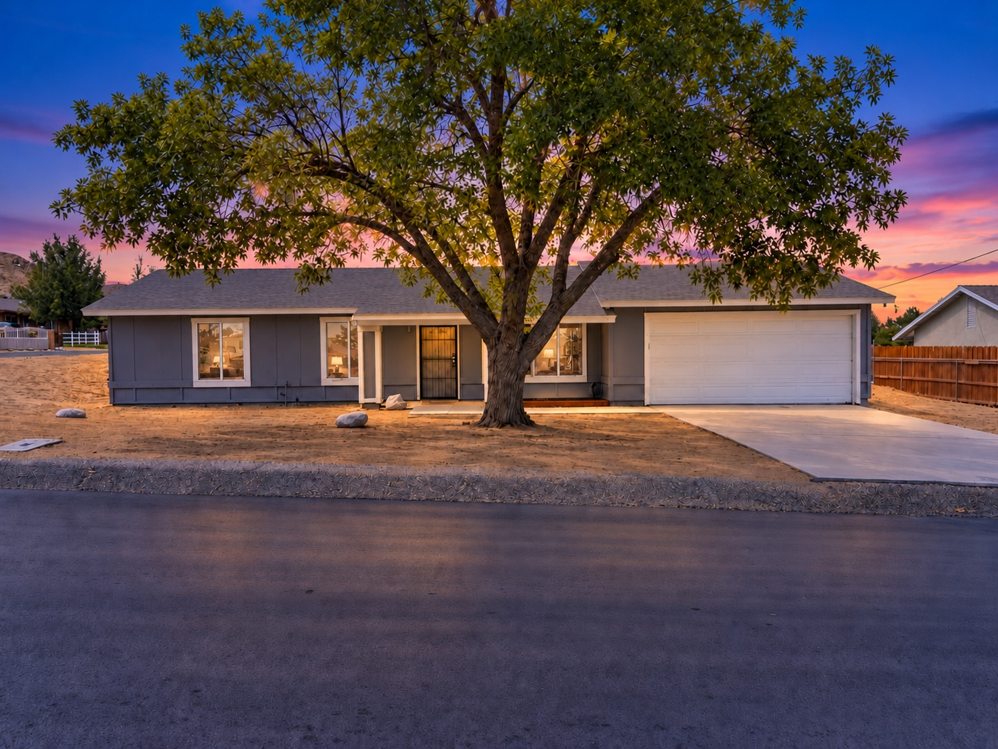 Twilight front exterior of 40205 162nd Street East in Palmdale, California