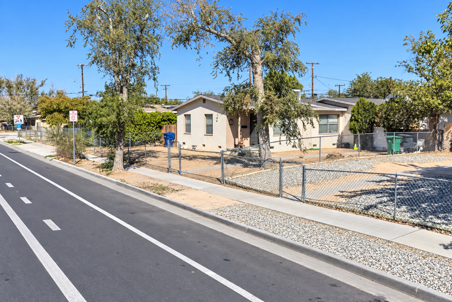 Front exterior of the duplex at 45348 10th Street W in Lancaster, California